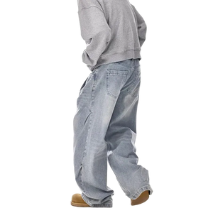 Person wearing a gray sweatshirt and light blue jeans on a white background