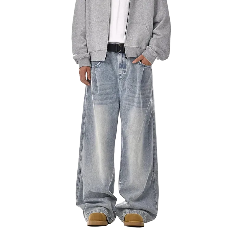 Person wearing a gray jacket and light blue jeans on a white background