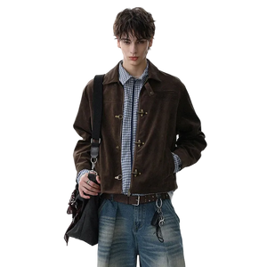 Man wearing a brown jacket, plaid shirt, and jeans on a white background