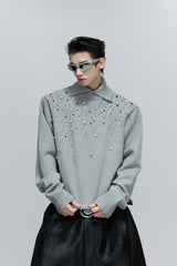 Perlenverzierter Zopfstrickpullover 