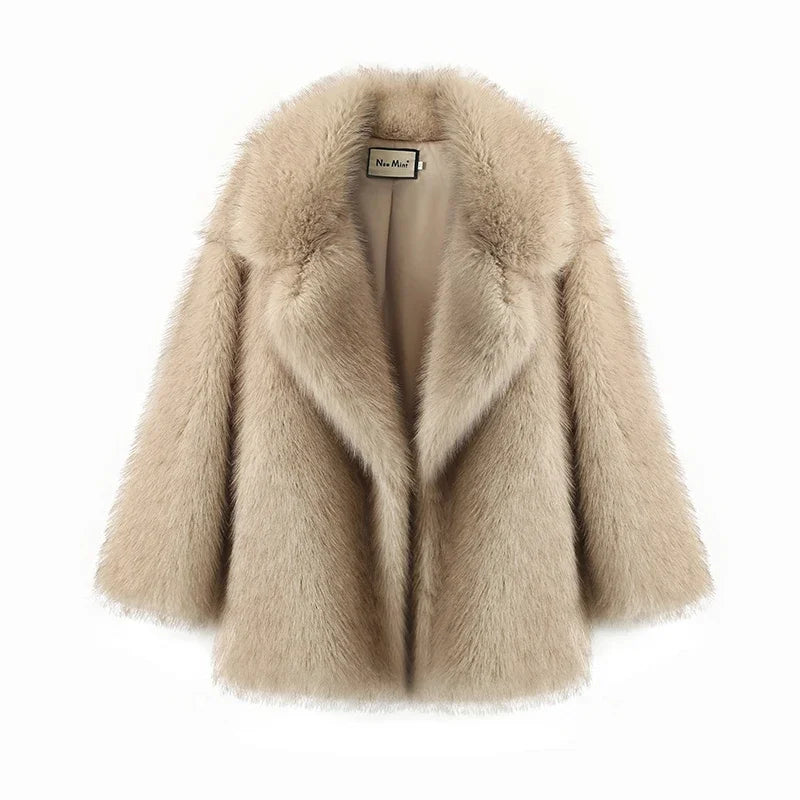 Beige fur coat on a white background