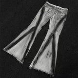 Bunte, ausgestellte Jeans mit Farbverlauf