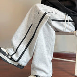 Japanische Jogginghose mit Streifenmuster und weitem Bein