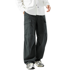 Person wearing dark gray cargo pants and a white shirt on a light gray background