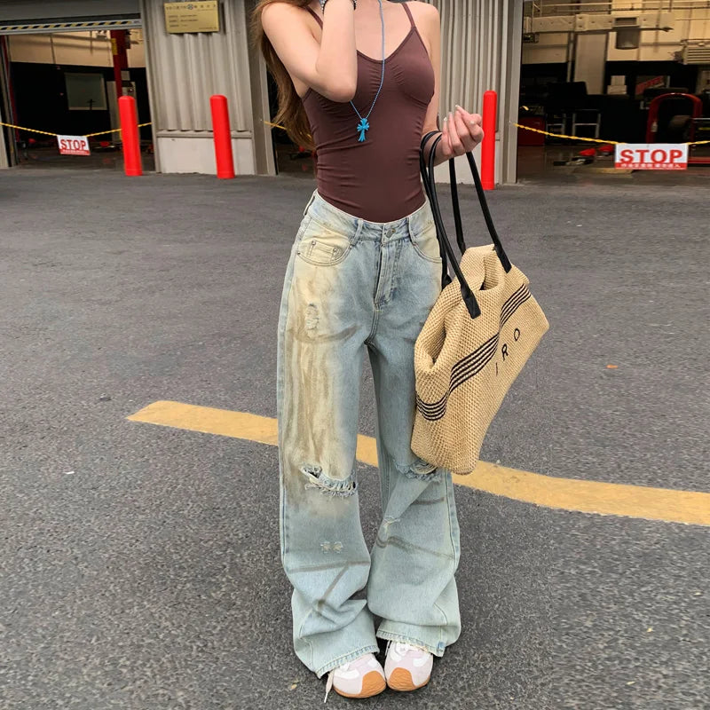 Moderne High-Waist-Jeans im Baggy-Stil mit Rissen