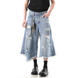 Hochwertige Jeans-Jots mit unregelmäßigen Löchern