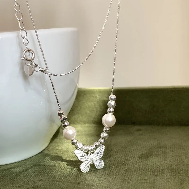 Elegant Sterling Silver Butterfly Pearl Necklace