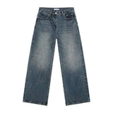 Pailletten-Patchwork-Jeans mit abgenutztem Saum und Maserung
