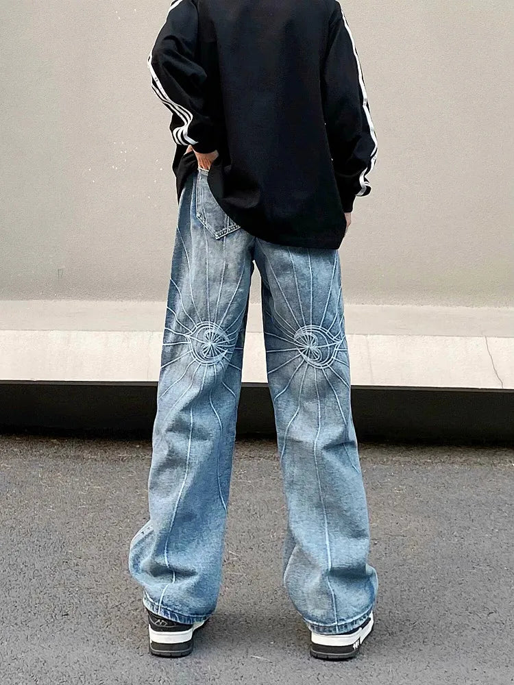Jean bleu délavé style gothique punk brodé