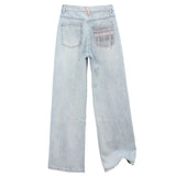 Vintage-Frühlingsjeans mit Schmetterlingsstickerei