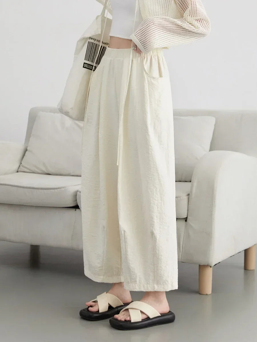 Pantalon plissé taille haute