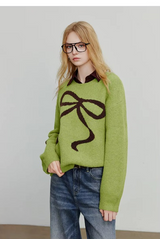 Pull femme jacquard à nœud papillon