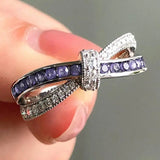 Elegante, knotenförmige Ringe aus violettem Zirkonia
