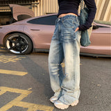 Bequeme, gewaschene Jeans mit niedrigem Bund und ausgestelltem Bein