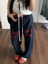Y2K Karo-Sweatpants im coolen Hip-Hop-Stil