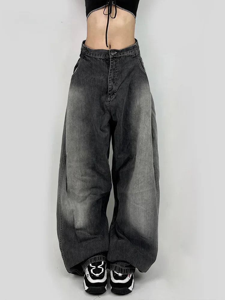 Jean en denim noir à taille haute et jambes larges