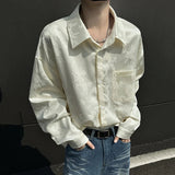 Chemise à revers et poche jacquard unie