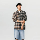 Chemise longue en coton patchwork à carreaux bicolores style streetwear