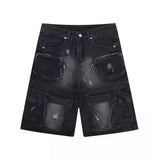 Short en jean noir à jambes larges et déchirées