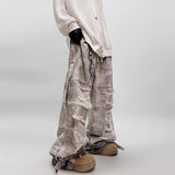 Vintage Jeans mit Rissen und Batikmuster