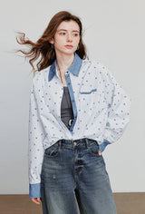 Gestreifte Damenbluse aus Denim mit Schleifenmuster und Patchwork-Design