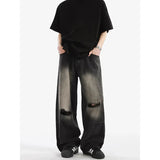 Vielseitige Streetwear-Jeans mit hohem Bund und Rissen in Schwarz.