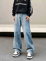 Jean bleu délavé style gothique punk brodé