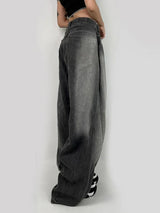 Jean en denim noir à taille haute et jambes larges