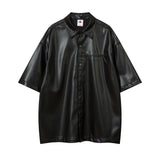 Chemise à manches courtes en cuir PU noir gaufré