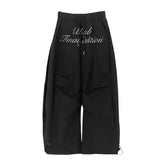 黒シックレタープリントパラシュートスウェットパンツ