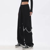 Schwarze Oversize-Streetwear-Hose mit Kette im Hip-Hop-Stil