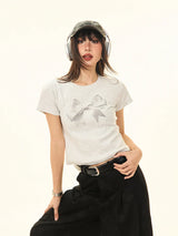Y2K Damen-Crop-Top mit Schleifenprint