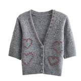 Herzschmeichelnder Kurzarmpullover mit V-Ausschnitt