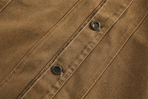 Close-up of a brown fabric with buttons