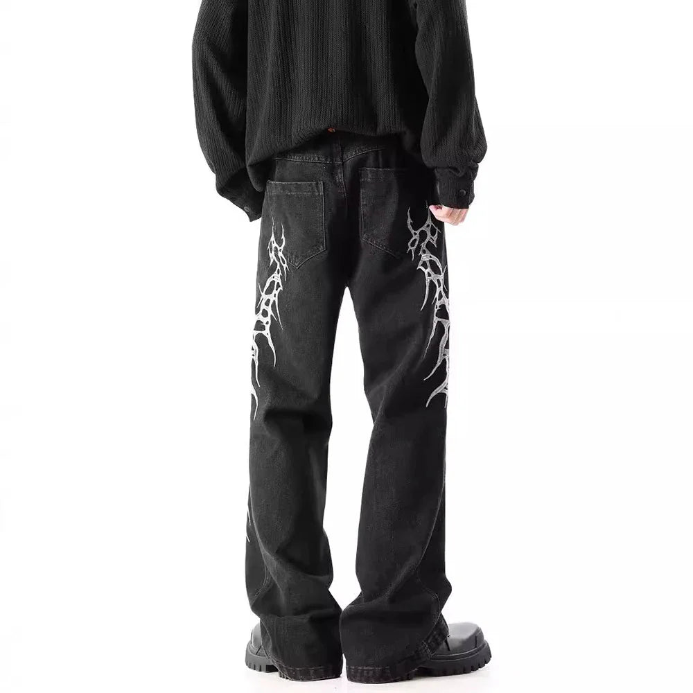 Schwarze, locker sitzende, gerade geschnittene Jeans im Y2K-Stil mit Stickerei