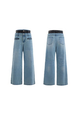 Gewaschene, abgenutzte Jeans im Lagenlook