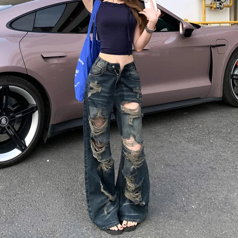 Atmungsaktive, gewaschene Jeans mit Rissen und hohem Bund