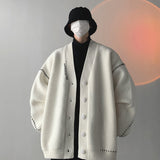 Gilet tricoté cousu