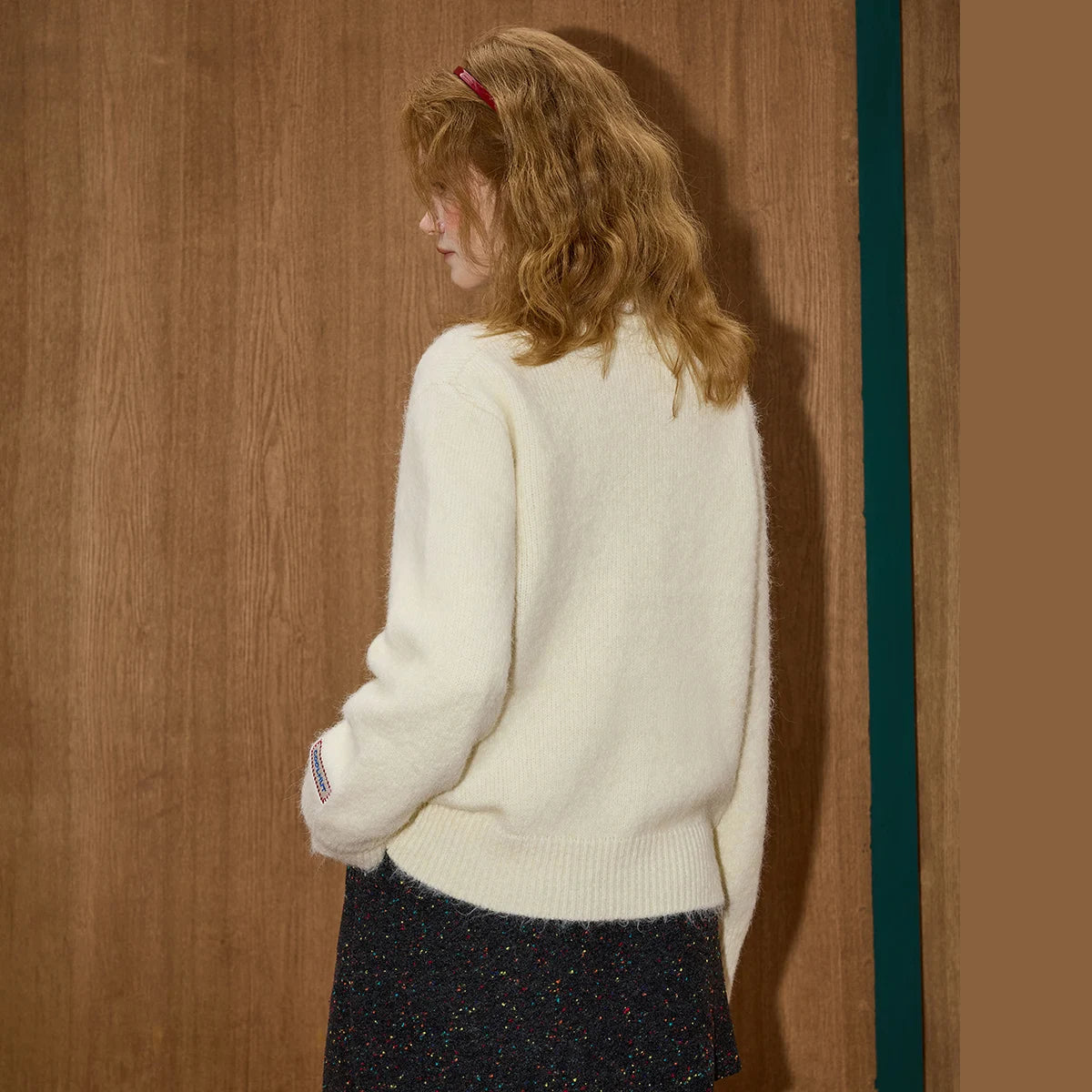 Damen-Strickjacke mit besticktem Herzknopf