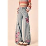 Vintage-Frühlingsjeans mit Schmetterlingsstickerei