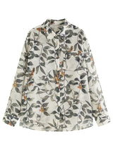 Chemise à imprimé végétal style vacances chic