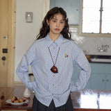 Chemise rayée brodée classique chic vintage pour femme