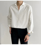 Chemise coréenne classique, cool et luxueuse à col en V et manches longues ajustée