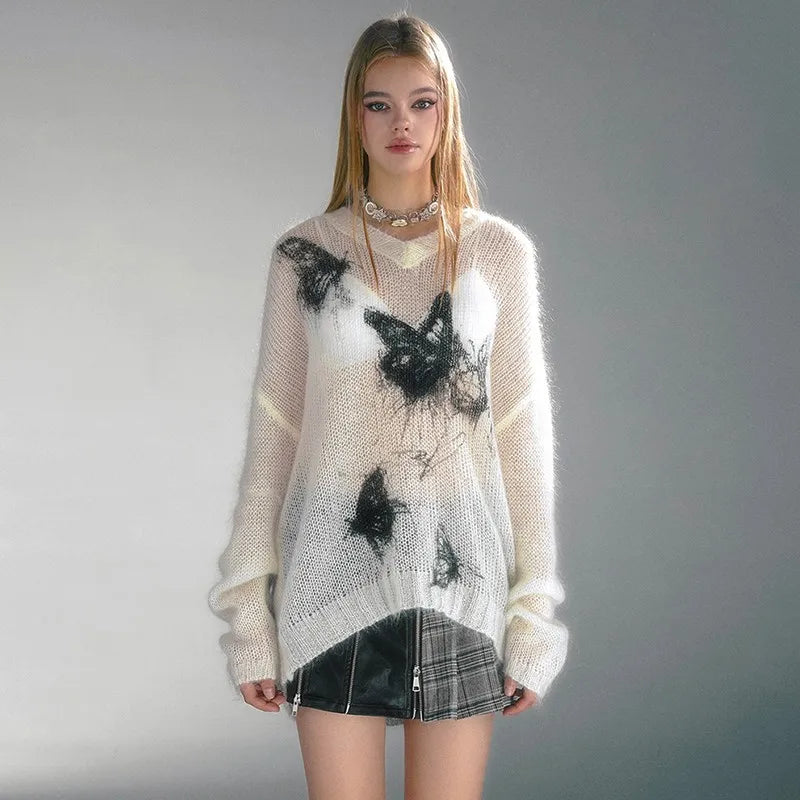 Stricktop im Vintage-Grunge-Stil mit Schmetterlingsprint