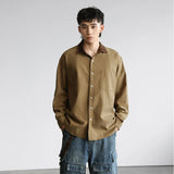 Chemise à manches longues décontractée, ample et élégante, style signature