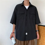 Chemise décontractée respirante à poches et coupe ample
