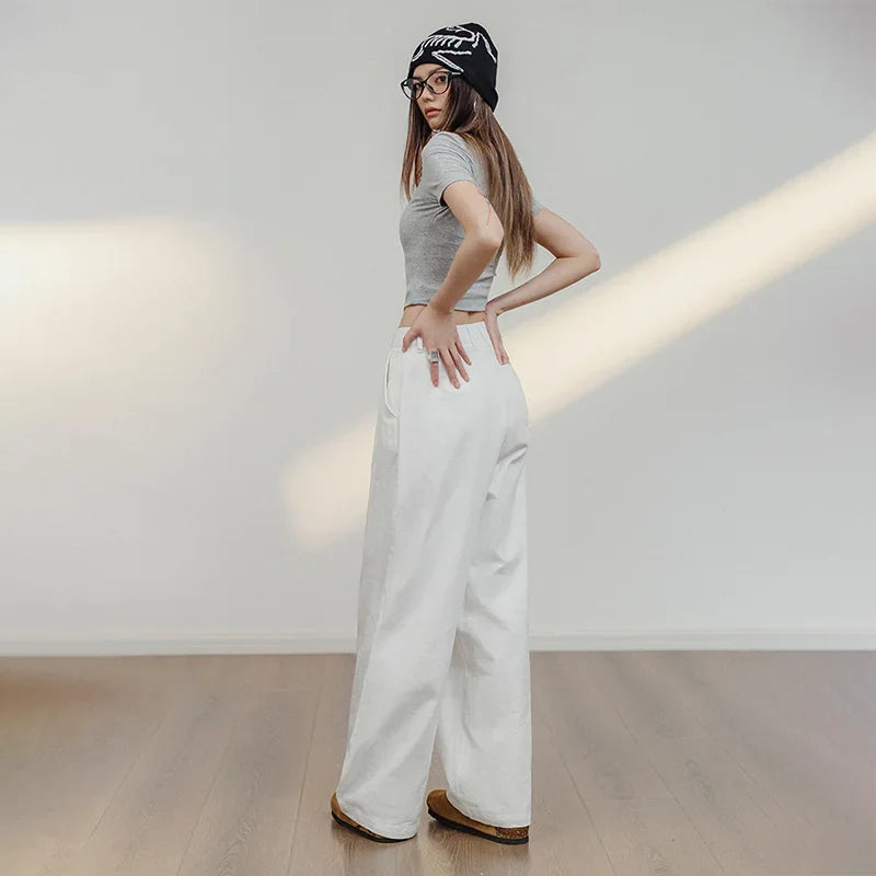 Weiße Baumwollhose mit weitem Bein