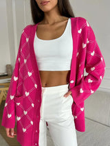 Damen-Strickjacke mit süßem rosa Herzchenmuster, Oversize-Größe