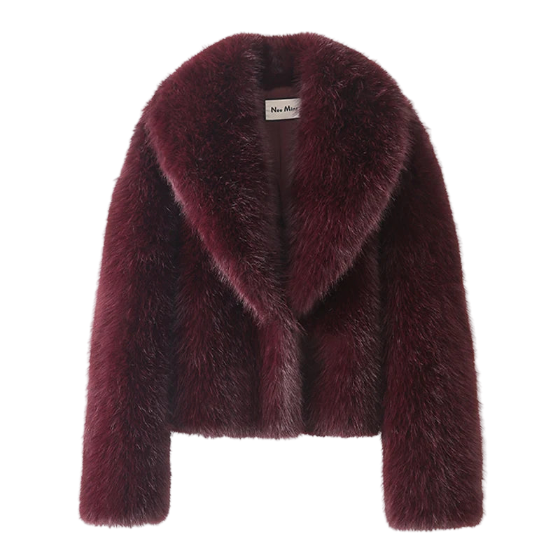 Style yourself in this luxurious black faux fur jacket, designed with an ultra-plush texture and voluminous collar for the ultimate glamorous streetwear statement.