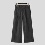Dark gray wide-leg pants on a hanger against a light gray background